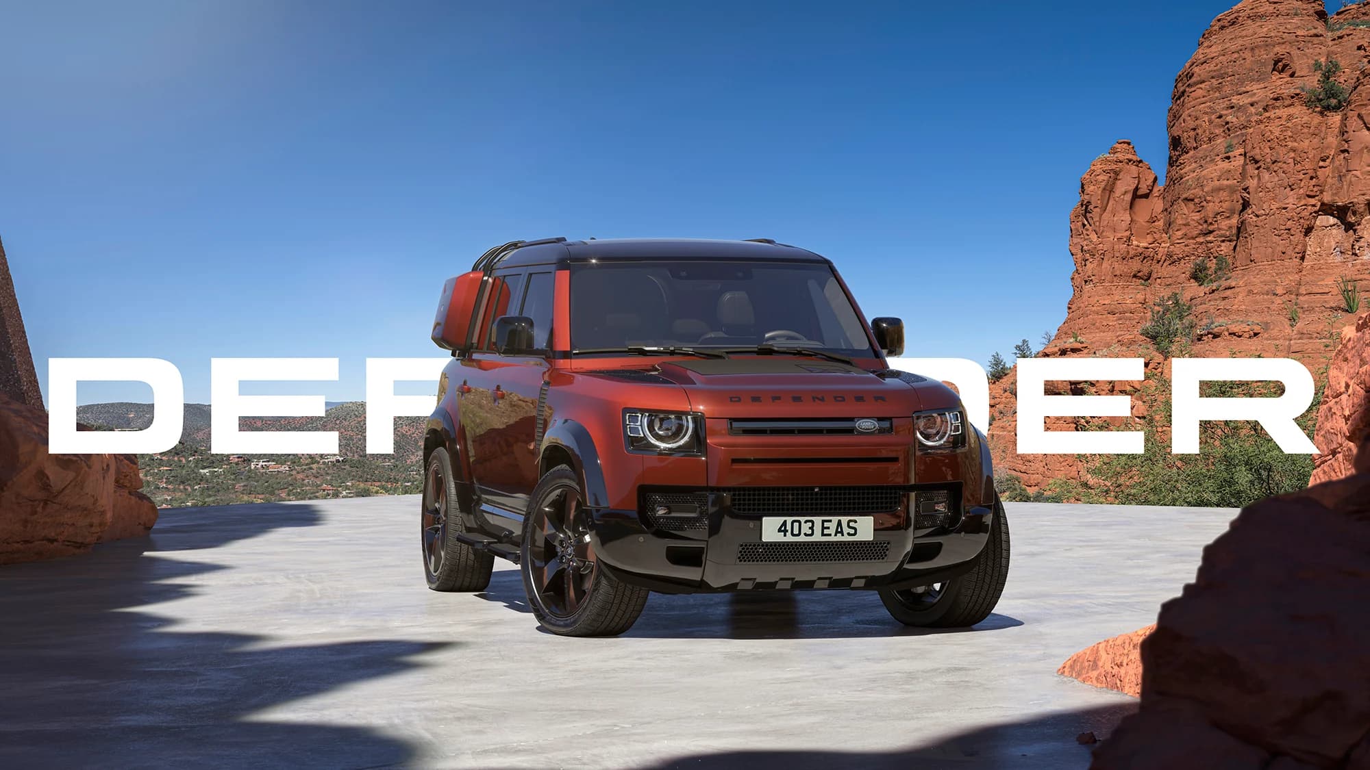 Land Rover Defender in desert landscape